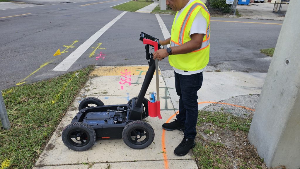 How are underground utilities detected? Ground Penetrating Radar (GPR) unit used to detect underground utilities.